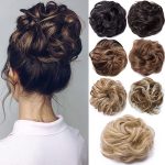 Woman with elegant updo and selection of hair bun extensions in various colours displayed beside her
